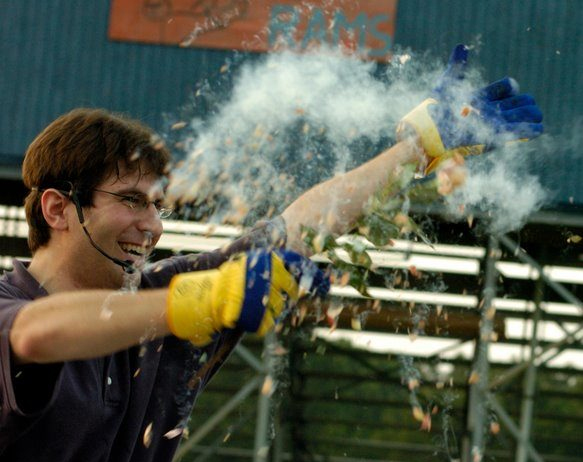 An instructor hurling a billowing cloud of liquid-nitrogen vapor during a Cool Science show